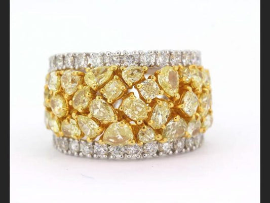 Yellow and White Diamond Bombe Ring, estimated 3.50 carats