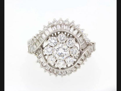 Central floral cluster with double crossover. Estimated 3.50 carat total