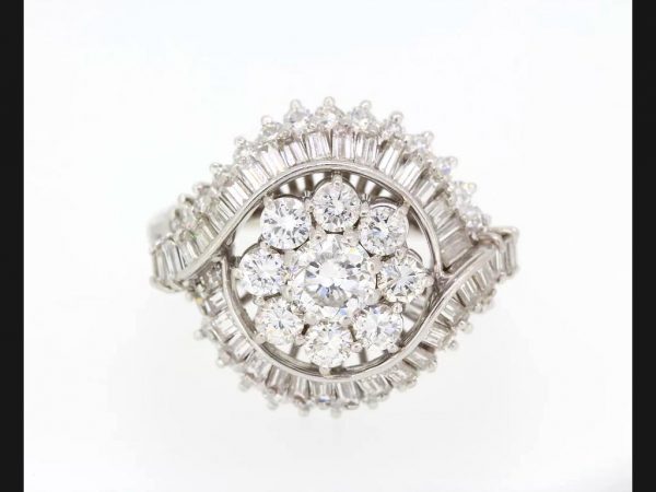 Central floral cluster with double crossover. Estimated 3.50 carat total