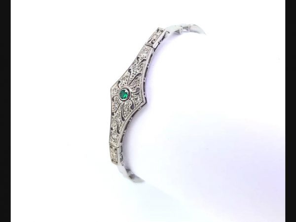 Vintage Emerald and Diamond Bracelet, on an expandable strap. Radiating the style of the Art Deco period