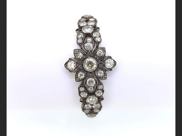 Antique Old-Cut Diamond Bracelet, set with 6.00 carats old-cut diamonds in a delicate floral pattern, set into silver on a high carat bracelet