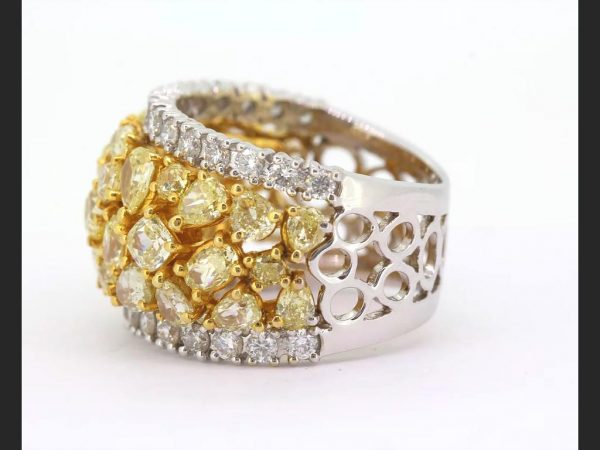 Yellow and White Diamond Bombe Ring; Central band of fancy yellow diamonds, est. total 3.50 ct