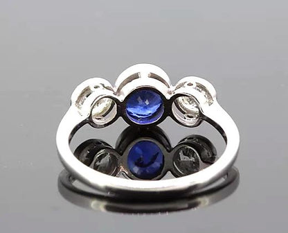Oval Sapphire and Diamond Trilogy Ring, 1.82 carat total, 18ct White Gold