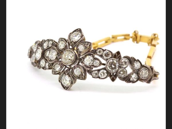 Antique Old-Cut Diamond Bracelet, set with 6.00 carats old-cut diamonds in a delicate floral pattern, set into silver on a high carat bracelet