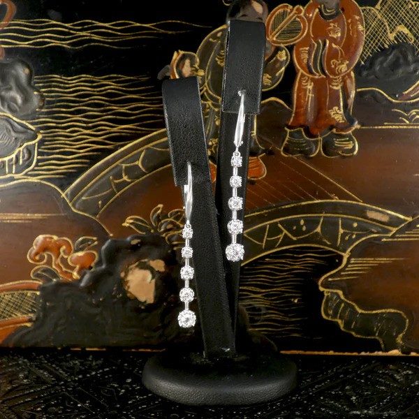 Diamond drop earrings in white gold.