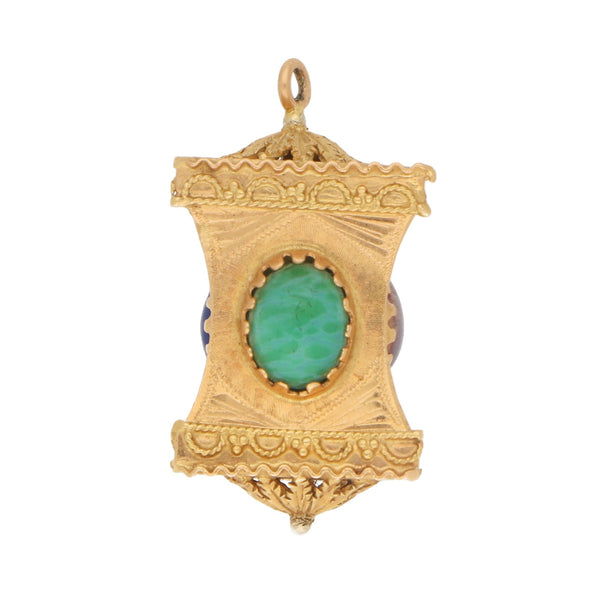 A yellow gold Chinese lantern charm with a green stone on a white background