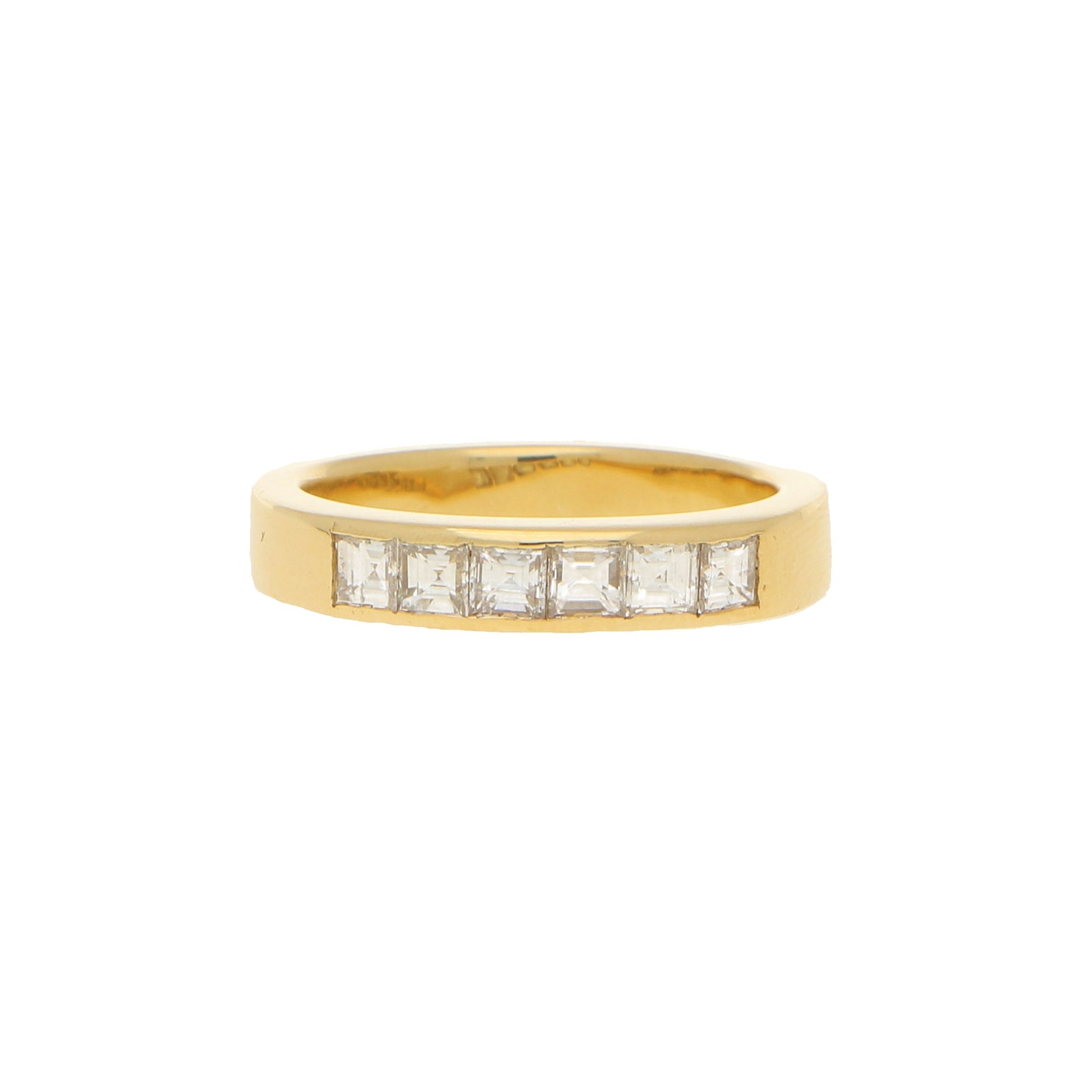 A yellow gold ring with six square diamonds, on a white background