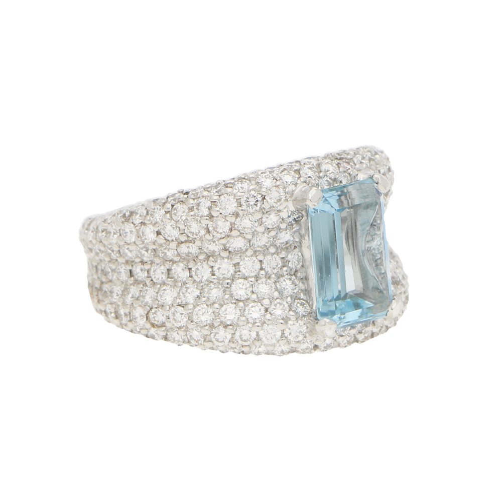 An incredibly sparkly 1.93ct emerald cut aquamarine and diamond bombe ring set in 18ct white gold.