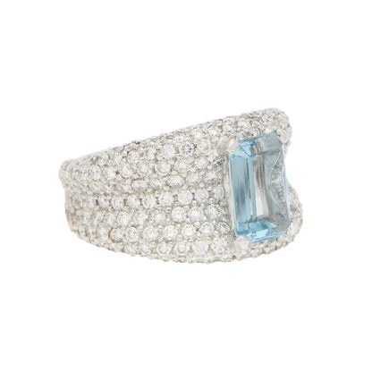 An incredibly sparkly 1.93ct emerald cut aquamarine and diamond bombe ring set in 18ct white gold.