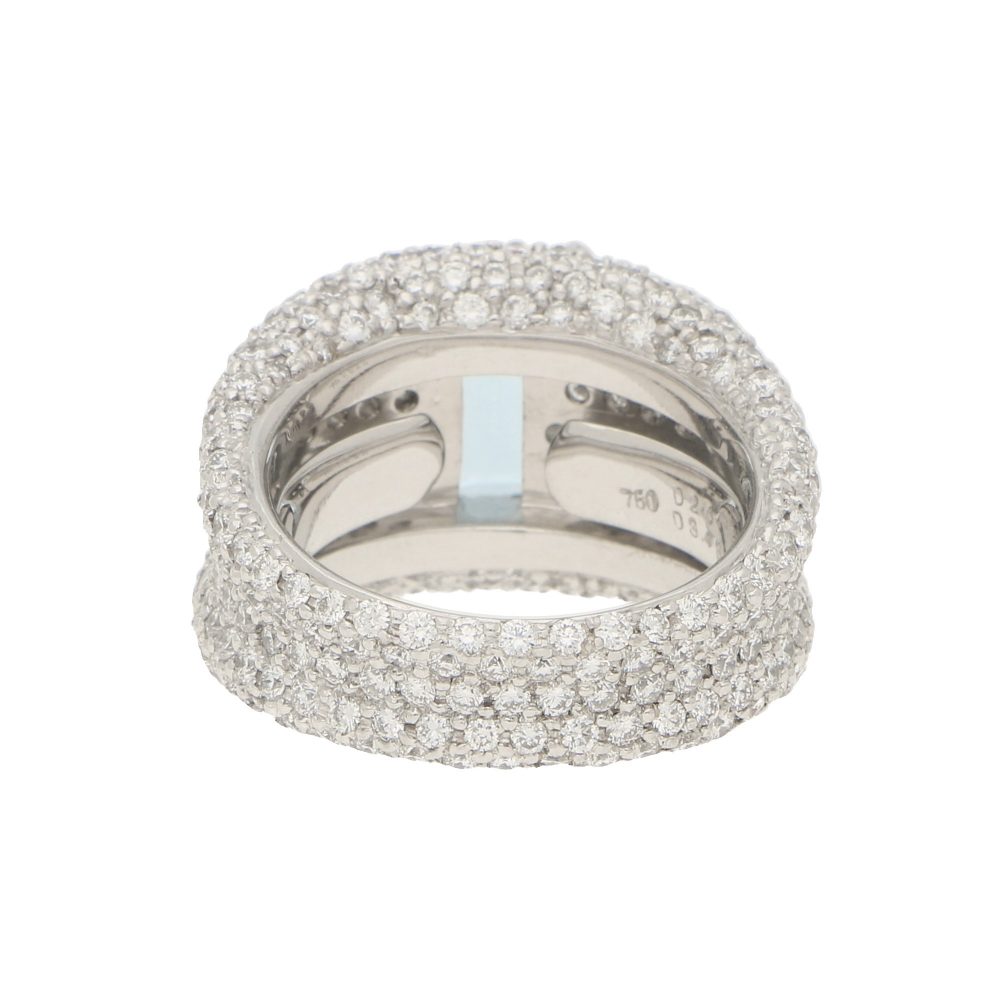 An incredibly sparkly 1.93ct emerald cut aquamarine and diamond bombe ring set in 18ct white gold.