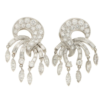 Diamond drop clip-on earrings set in platinum and gold.