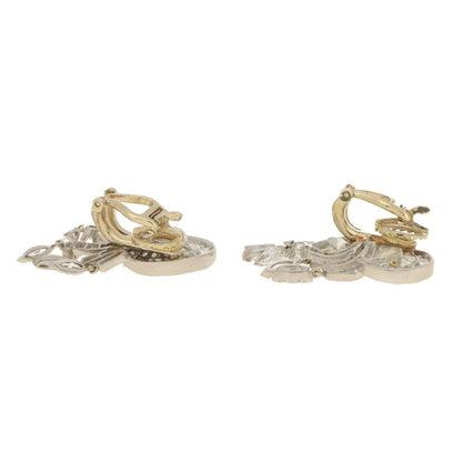 Diamond drop clip-on earrings set in platinum and gold.