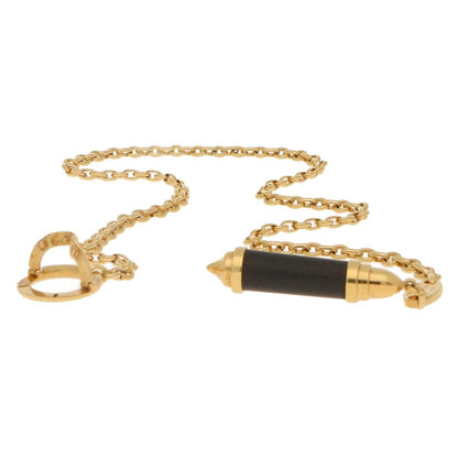 Chaumet necklace in yellow gold with snakewood pendant.