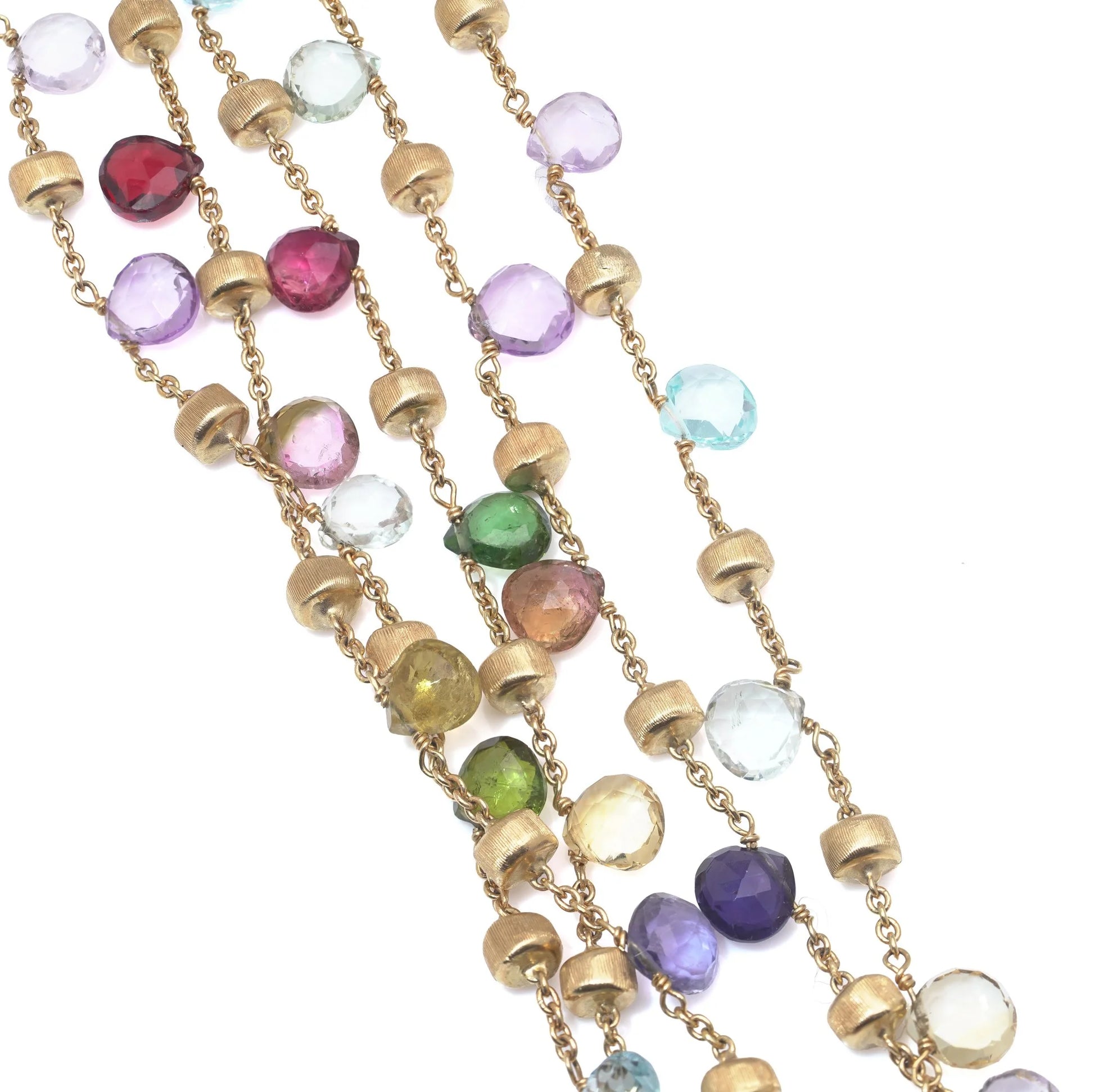 A yellow gold five row multi-gemstone bracelet