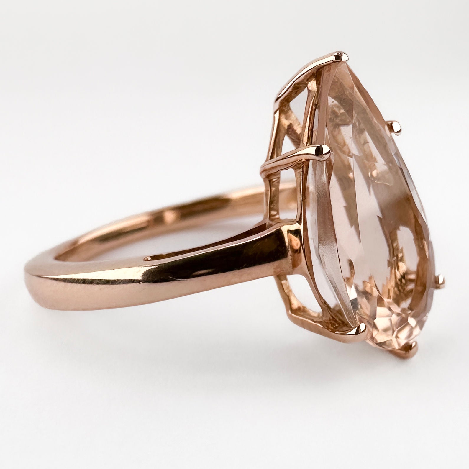 Contemporary Pear Shape Morganite Solitaire Engagement Ring in Rose Gold