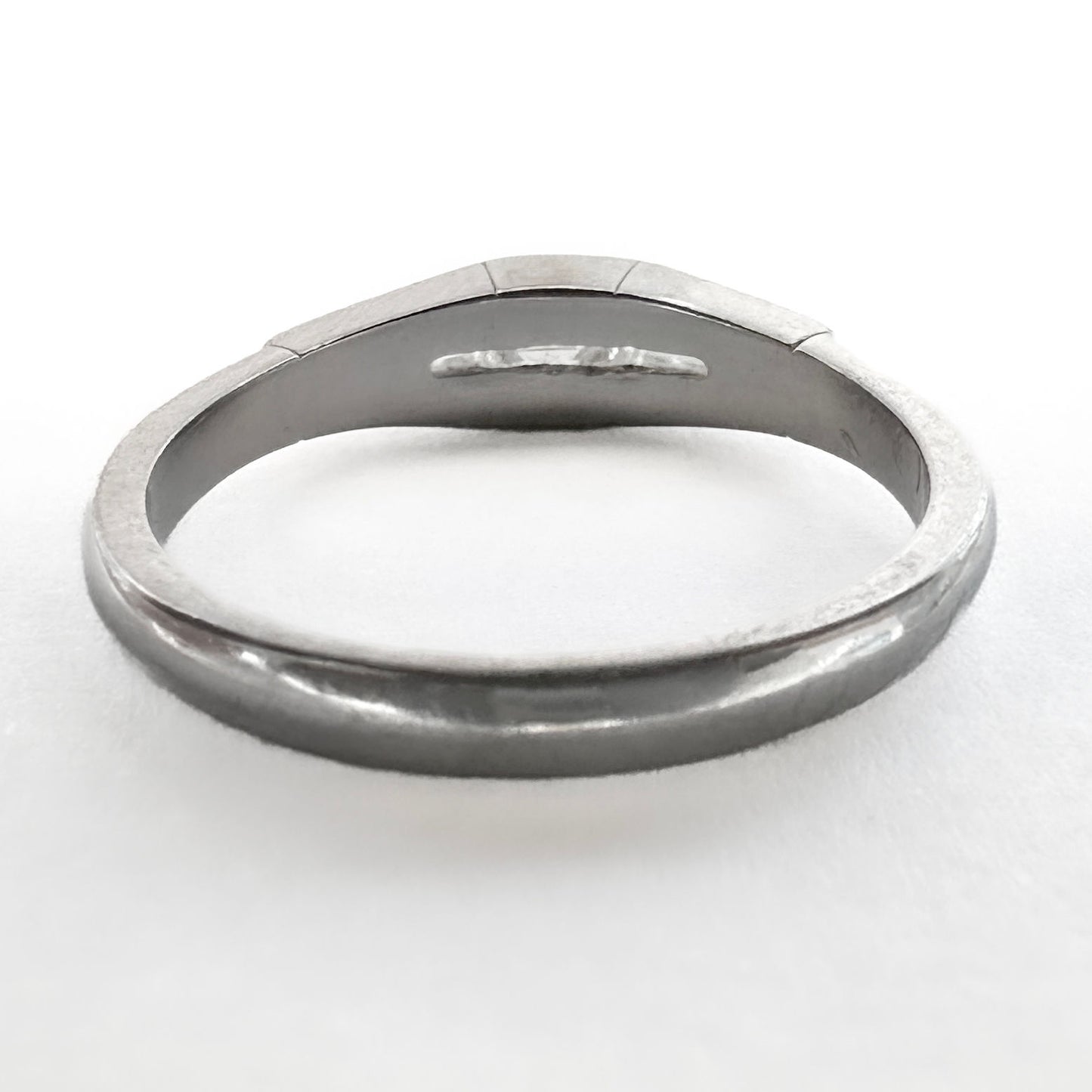 Vintage Emerald and Tapered Baguette Diamond Three Stone Engagement Ring in Platinum