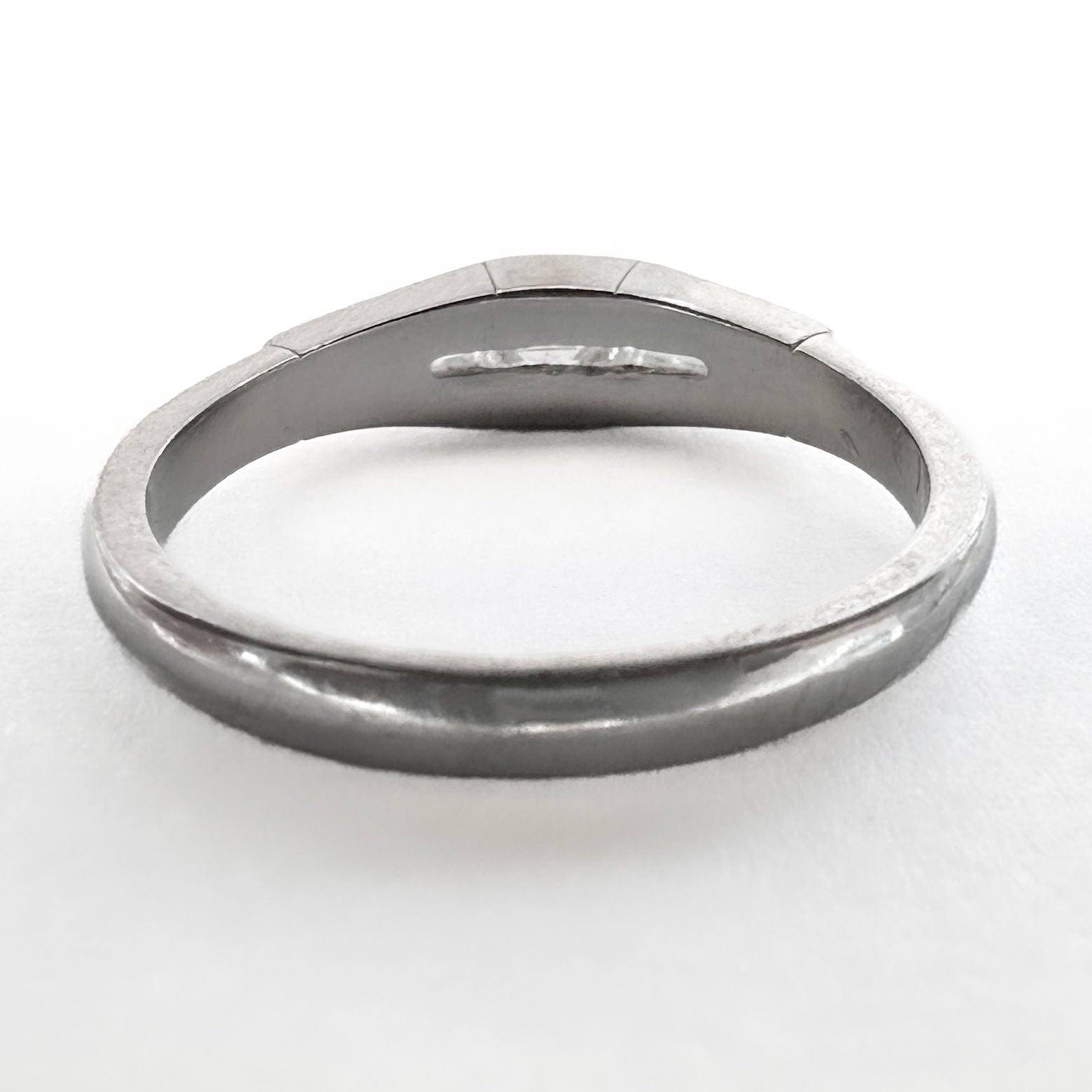 Vintage Emerald and Tapered Baguette Diamond Three Stone Engagement Ring in Platinum