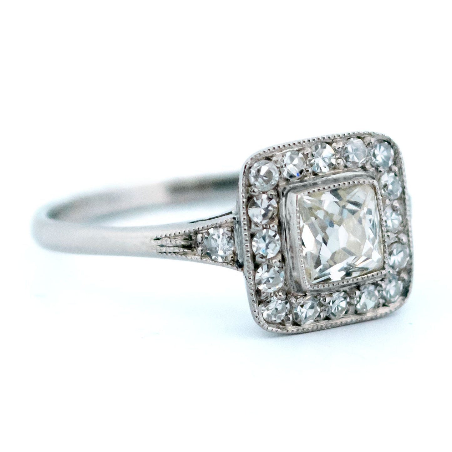 A square shaped diamond cluster ring in platinum