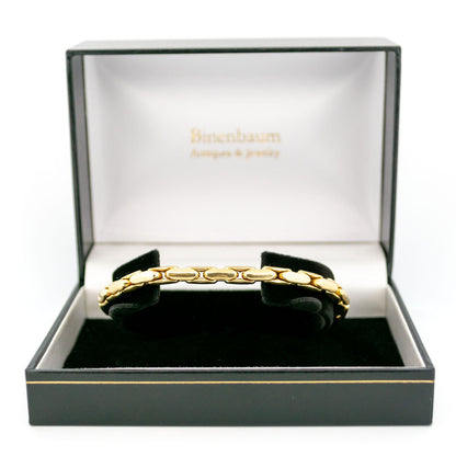 A yellow gold elongated box link bracelet, in a box