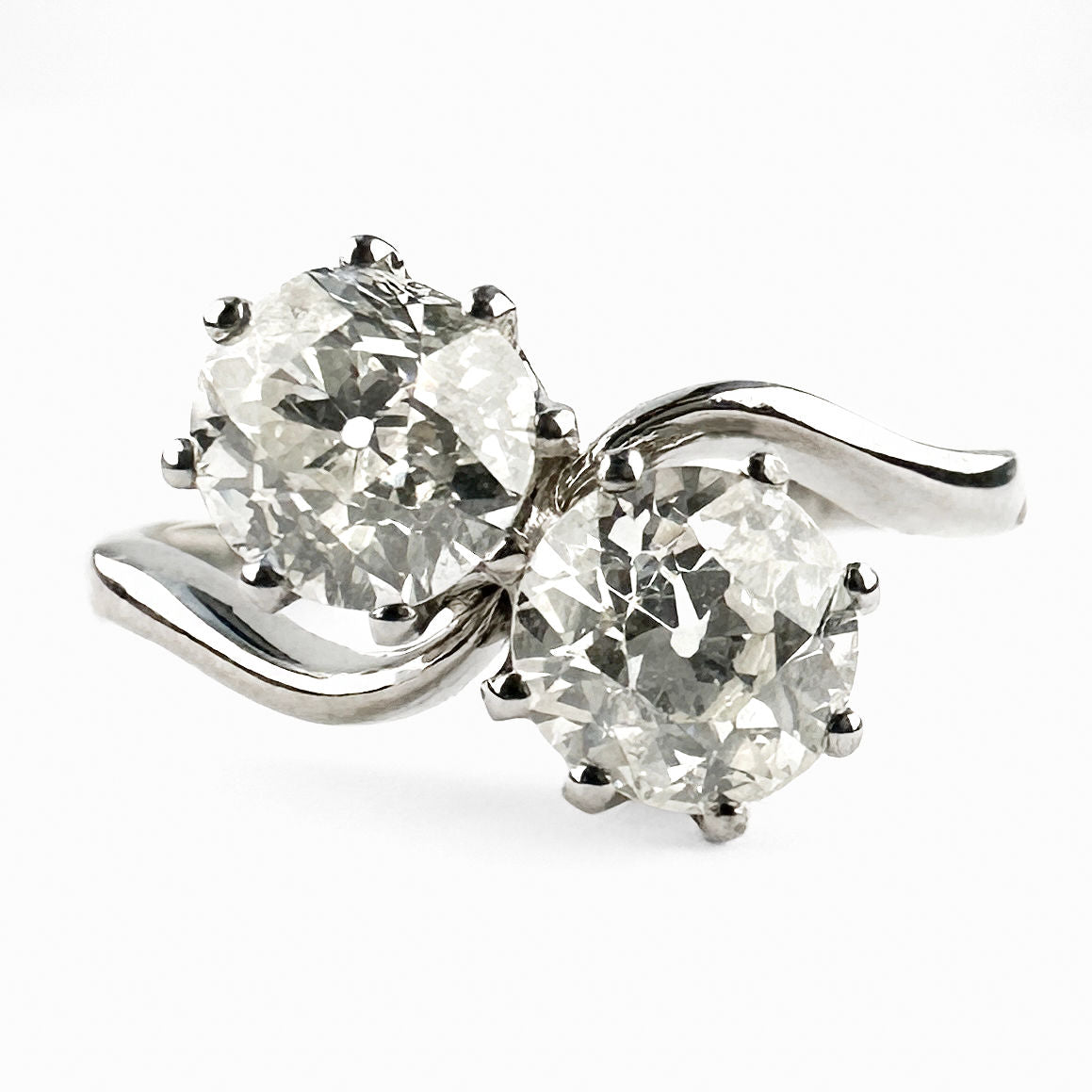 Edwardian Antique Two Stone Crossover Toi et Moi Ring in Platinum