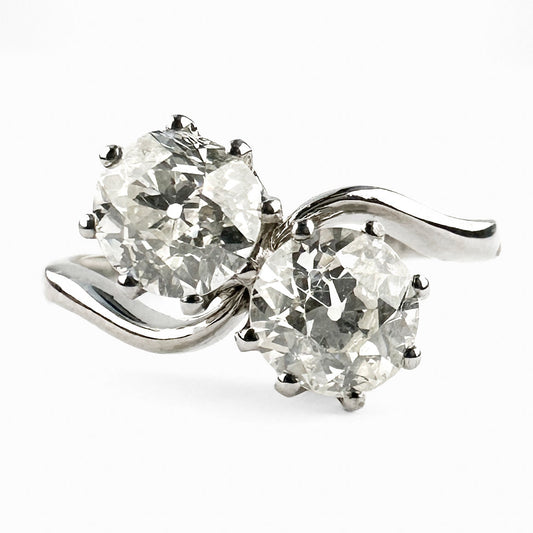 Edwardian Antique Two Stone Crossover Toi et Moi Ring in Platinum