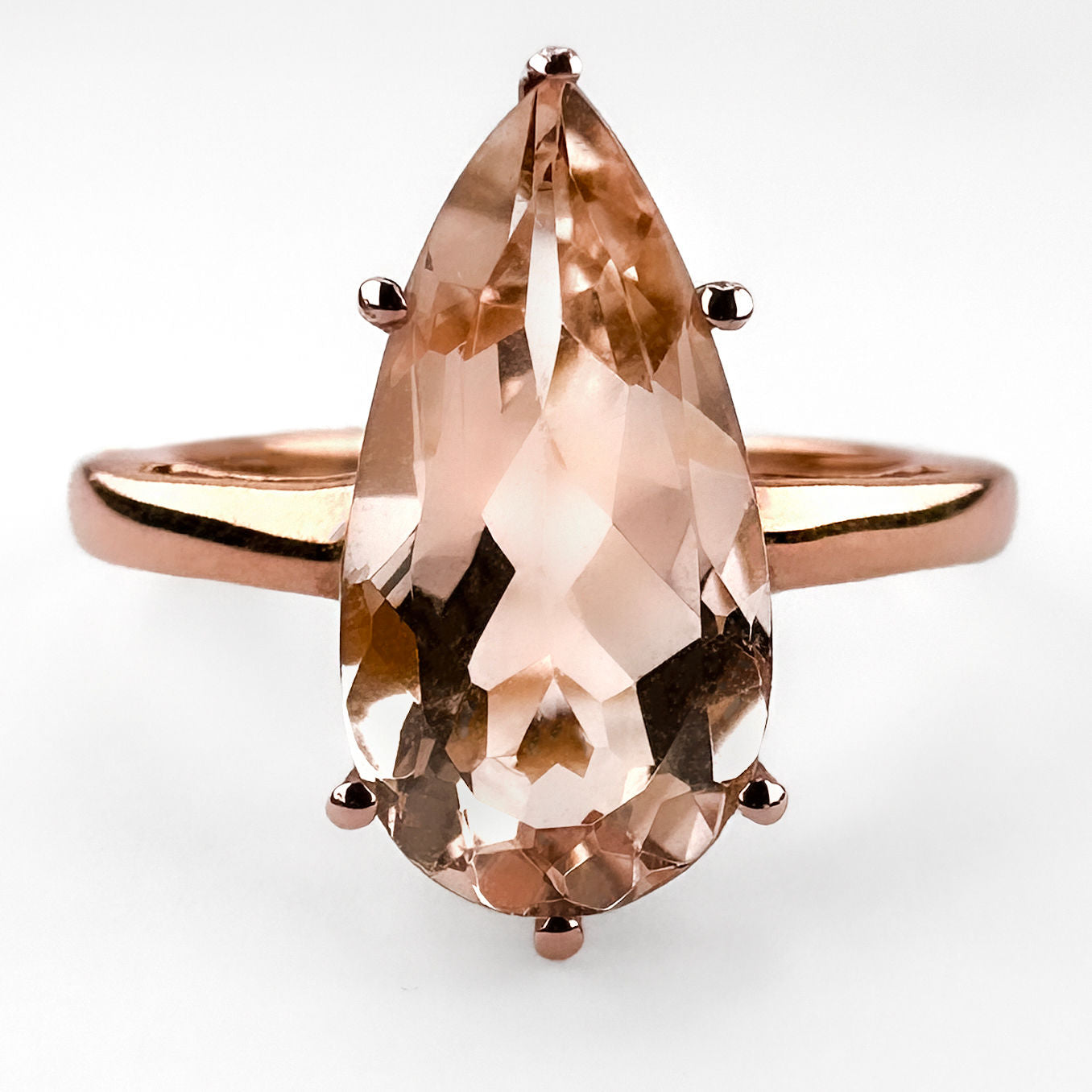 Contemporary Pear Shape Morganite Solitaire Engagement Ring in Rose Gold