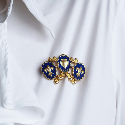 Antique Blue Enamel Fleur de Lys 18ct Gold Brooch in Triple Cartouche Design