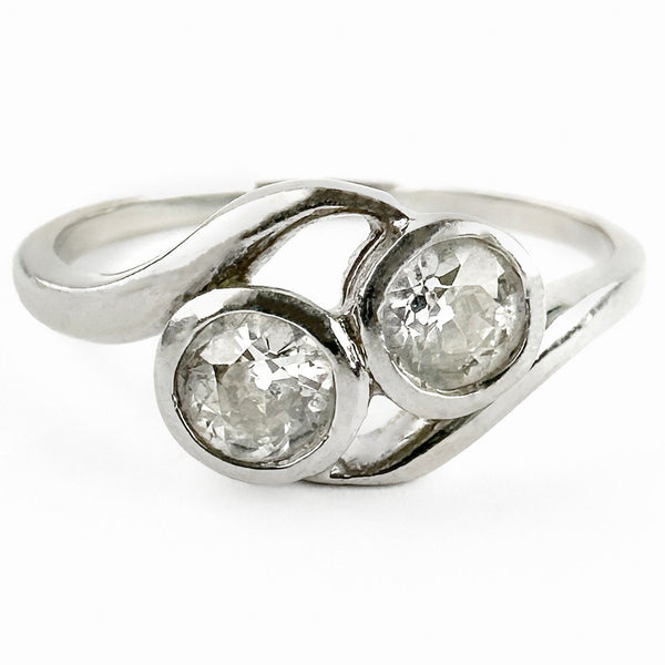 Edwardian Antique Diamond Toi et Moi Two Stone Crossover Engagement Ring in Platinum