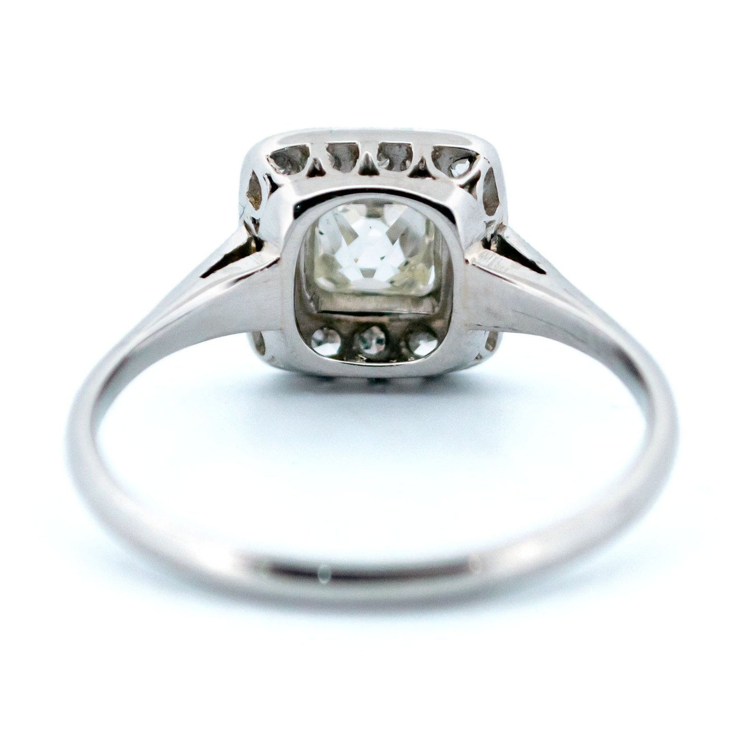 A square shaped diamond cluster ring in platinum