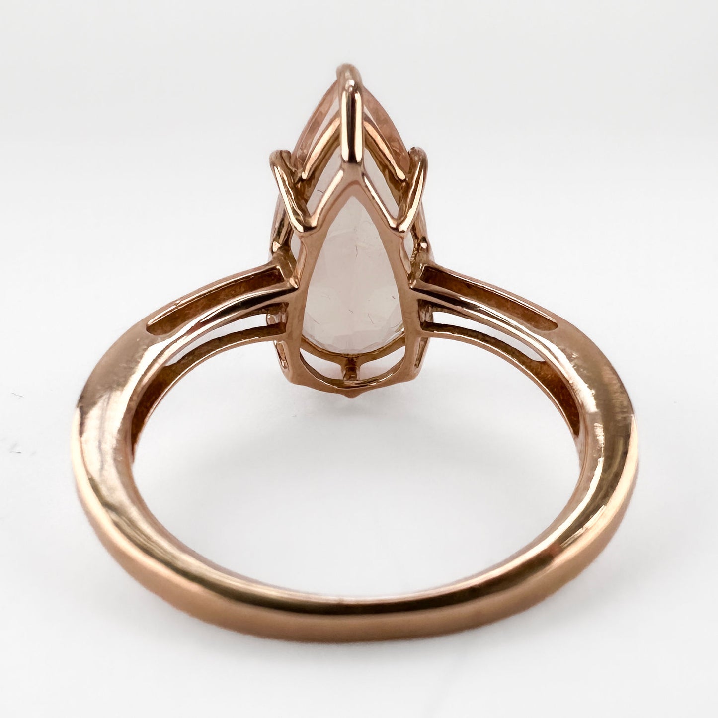 Contemporary Pear Shape Morganite Solitaire Engagement Ring in Rose Gold