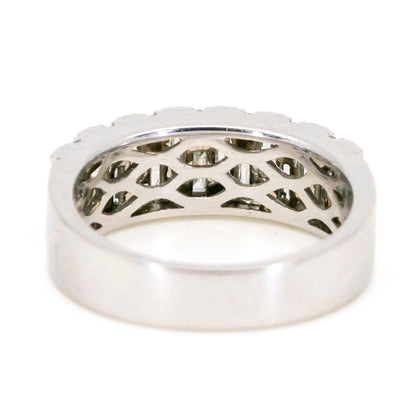 A baguette cut and brilliant cut diamond band ring in white gold