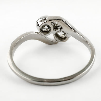 Edwardian Antique Diamond Toi et Moi Two Stone Crossover Engagement Ring in Platinum