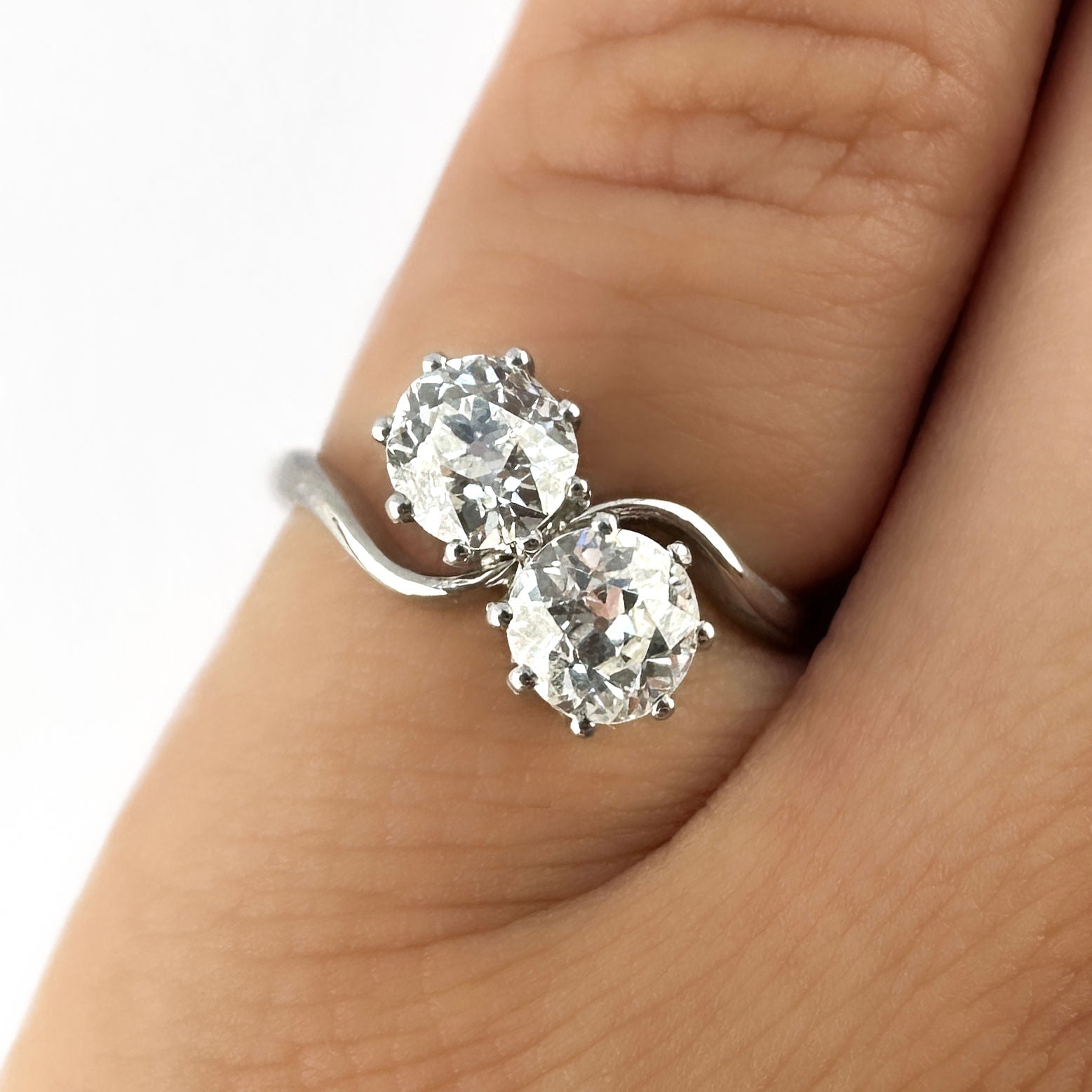 Edwardian Antique Two Stone Crossover Toi et Moi Engagement Ring in Platinum