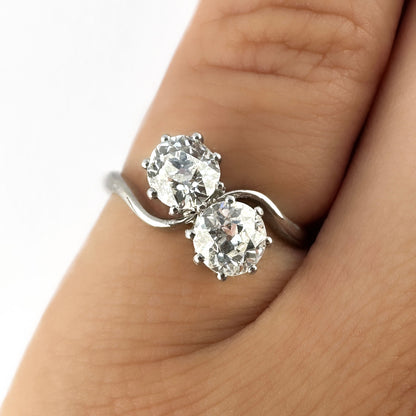 Edwardian Antique Two Stone Crossover Toi et Moi Engagement Ring in Platinum