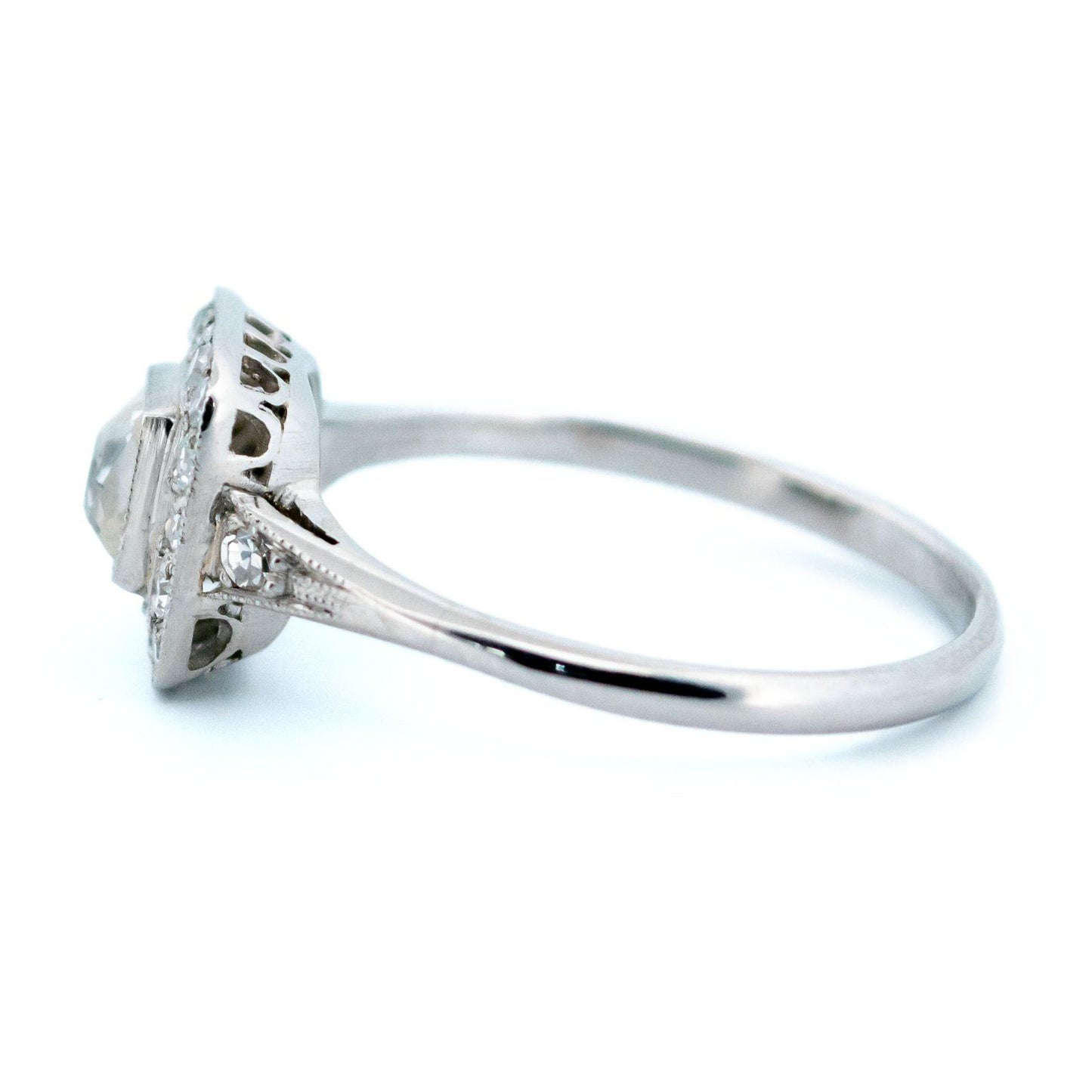 A square shaped diamond cluster ring in platinum