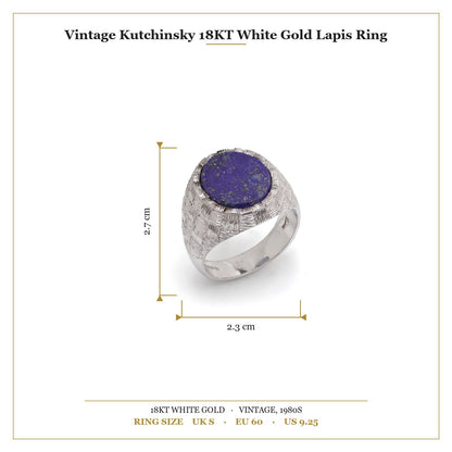 A white gold textured ring with an oval lapis lazuli, with measurements