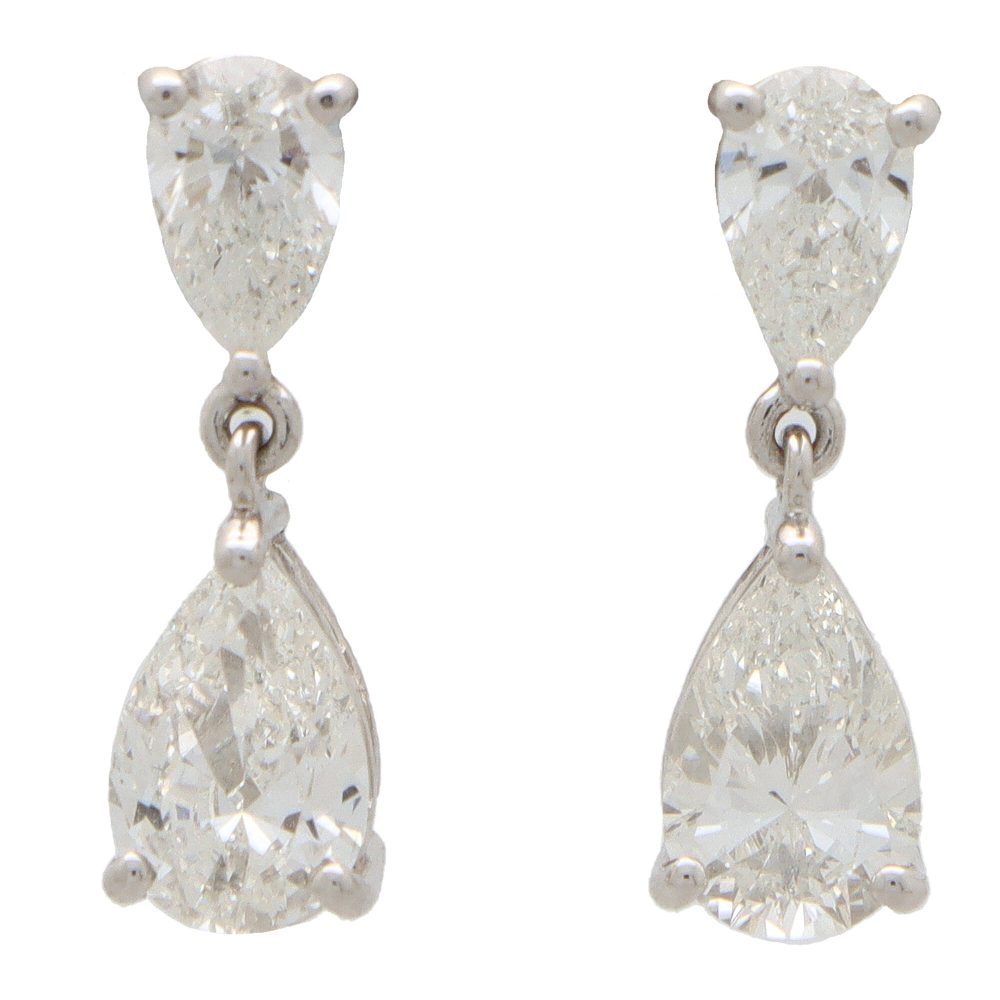 Diamond drop earrings set in platinum.