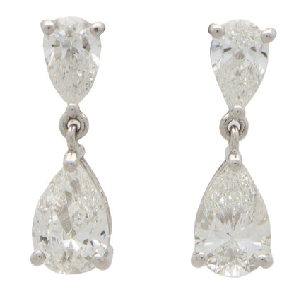 Diamond drop earrings set in platinum.