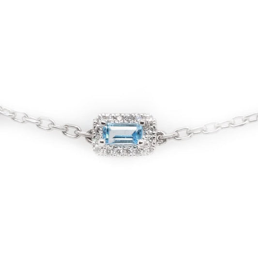 A white gold blue topaz and diamond cluster link bracelet