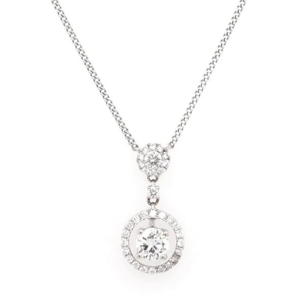 A white gold diamond double cluster drop pendant necklace, on an integrated chain