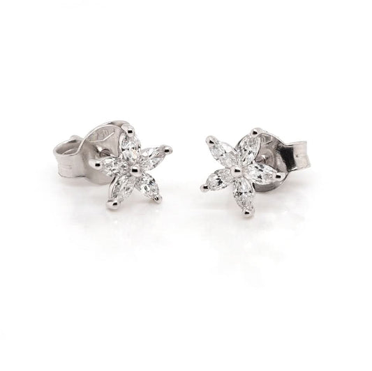 A pair of flower shaped stud earrings set with marquise cut diamonds, in white gold