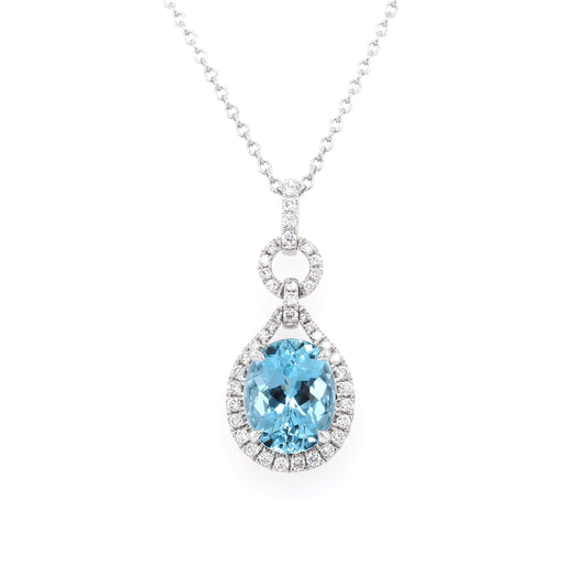 An aquamarine and diamond cluster drop pendant on a white gold chain