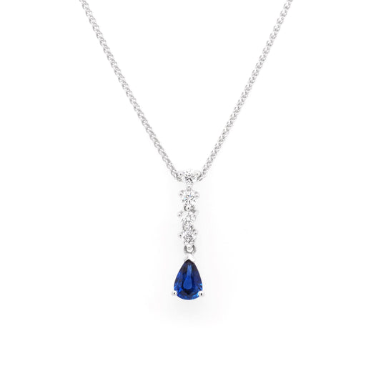 A sapphire and diamond drop pendant in white gold, with a white gold chain