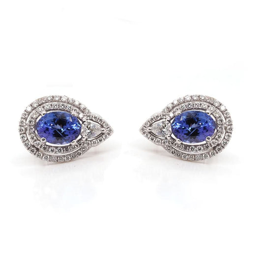 A pair of white gold tanzanite and diamond cluster stud earrings