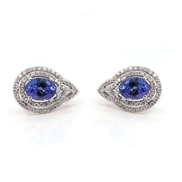 A pair of white gold tanzanite and diamond cluster stud earrings