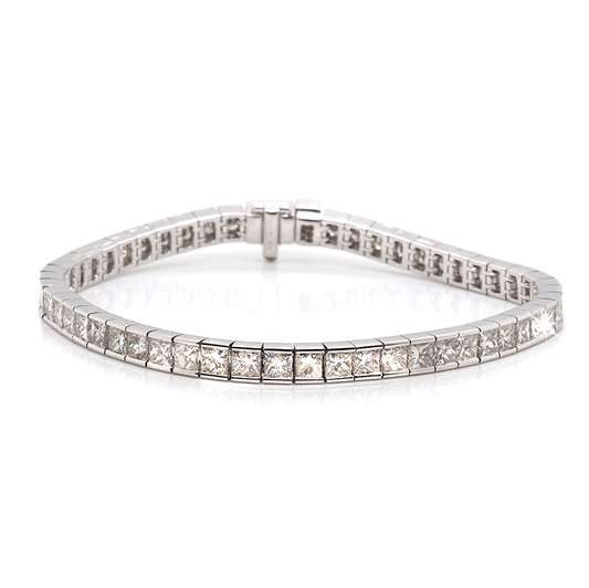 A white gold princess cut diamond channel set line bracelet