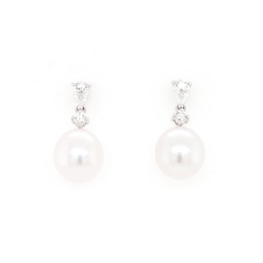 A pair of pearl and diamond drop earrings in white gold