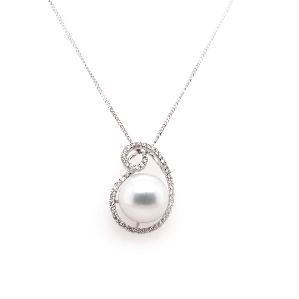 A white gold pearl and diamond pendant on a white gold fine curb  chain