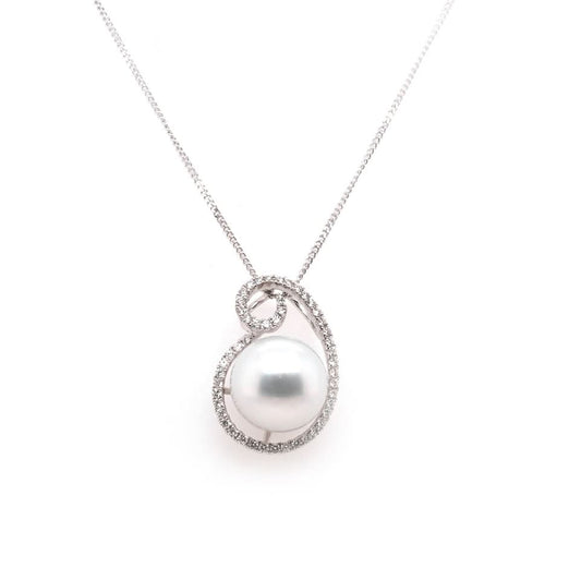 A white gold pearl and diamond pendant on a white gold fine curb  chain
