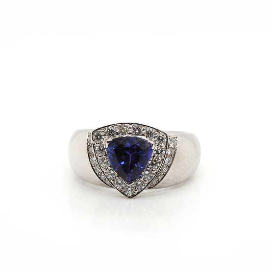 A tanzanite and diamond wide band dress ring in white gold